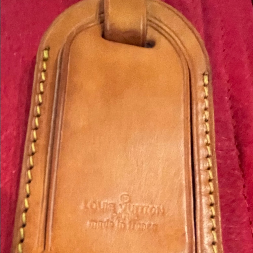 LV luggage tag. Vacehette leather with gorgeous patina